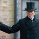 Pip Torrens as Lord Massen, casually holding a bomb.